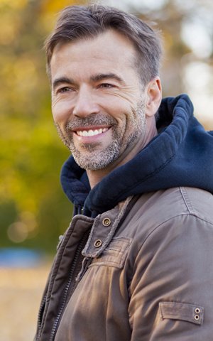 man with a beautifully restored smile in Halesite