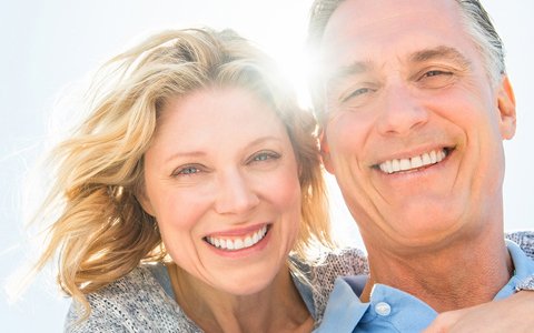 older smiling couple in Halesite