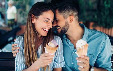 happy restorative dentistry patients eating icecream in Huntington NY