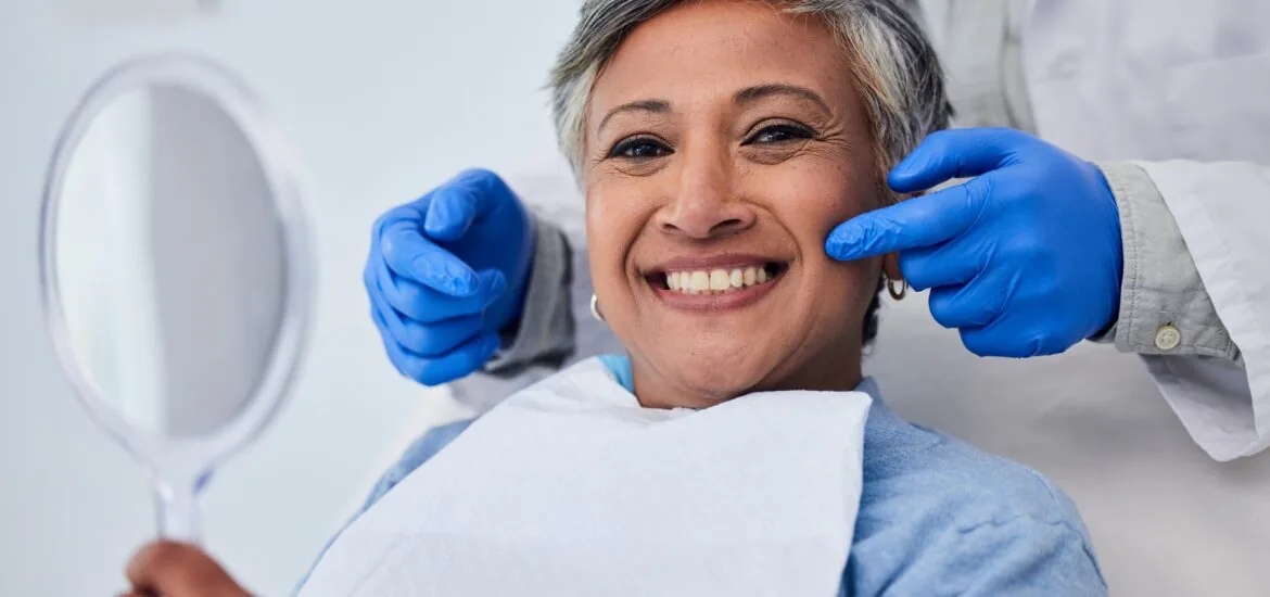 older woman showing off her perfect gum line in Huntington