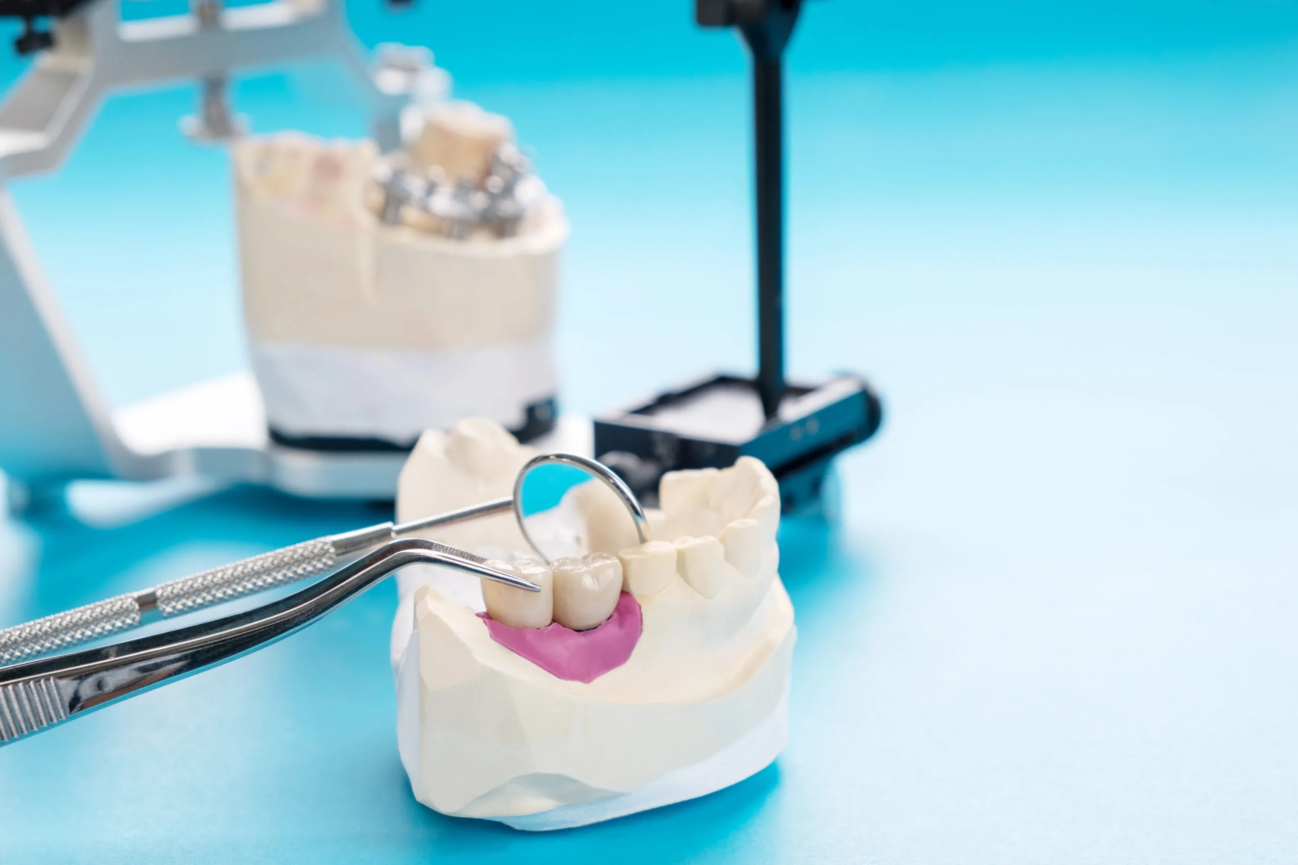dentures being customized in lab