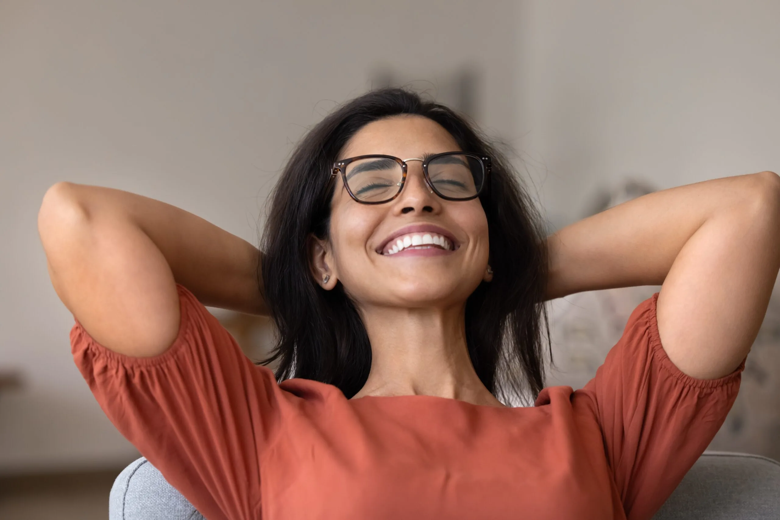 happy young woman showing her perfect white smile
